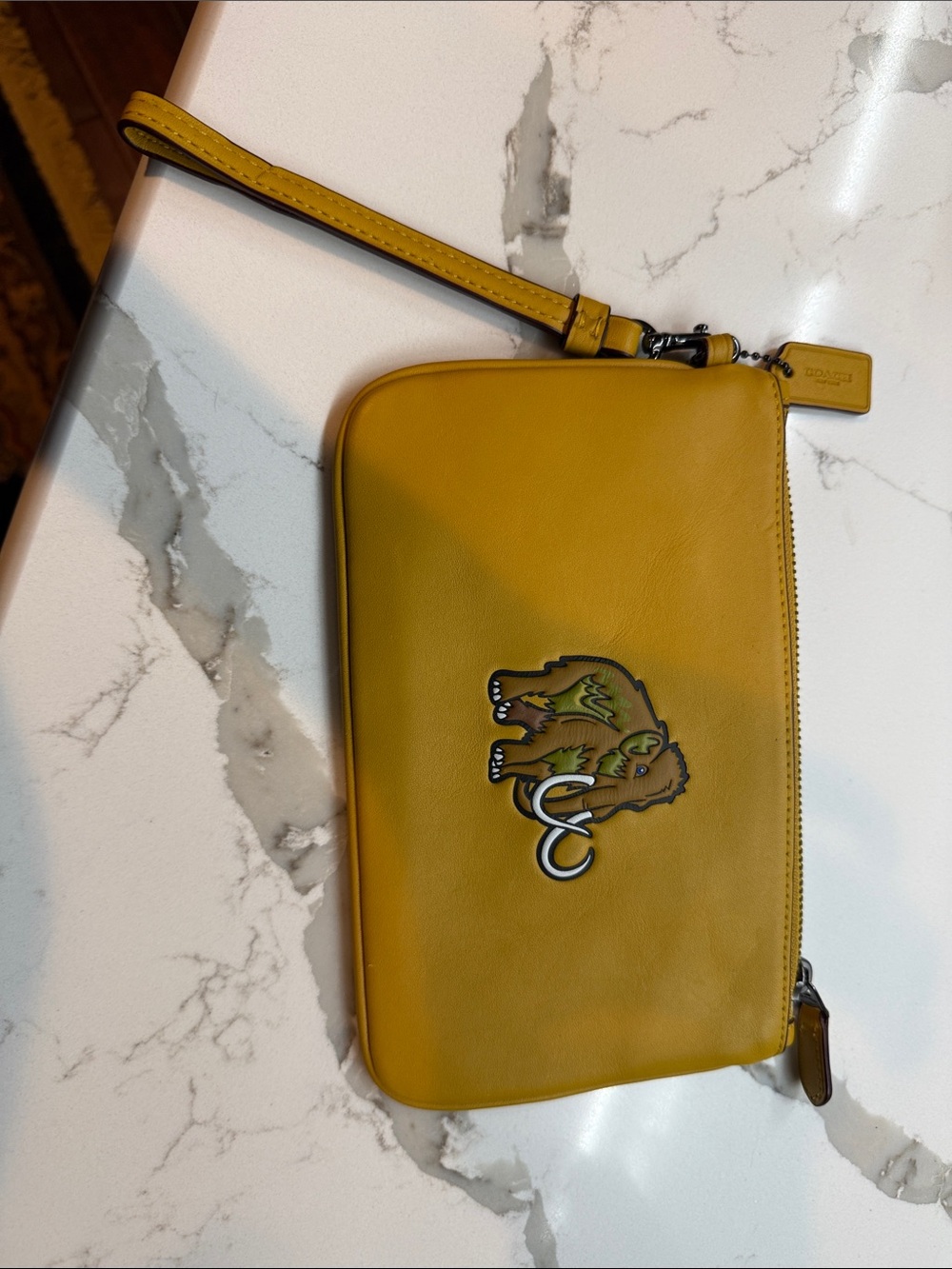 Coach Yellow Leather Wristlet with Mammoth Motif